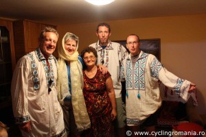 Cyclists-trying-Romanian-traditional-suits