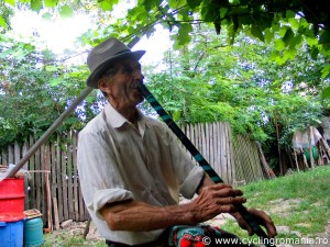 Local-villager-playing-his-flute
